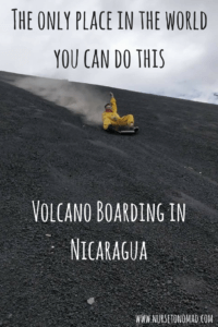 Volcano Boarding down Cerro Negro in Nicaragua, sliding down on volcanic ash