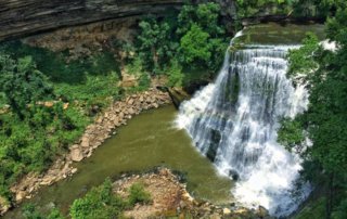 Burgess Falls, tall waterfall cascading over rocks, Tennessee