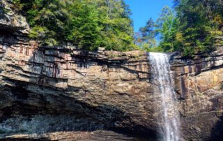 Foster Falls from the base of the falls, azure water and blue skies