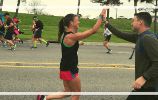 High five during Rock n Roll New Orleans Marathon