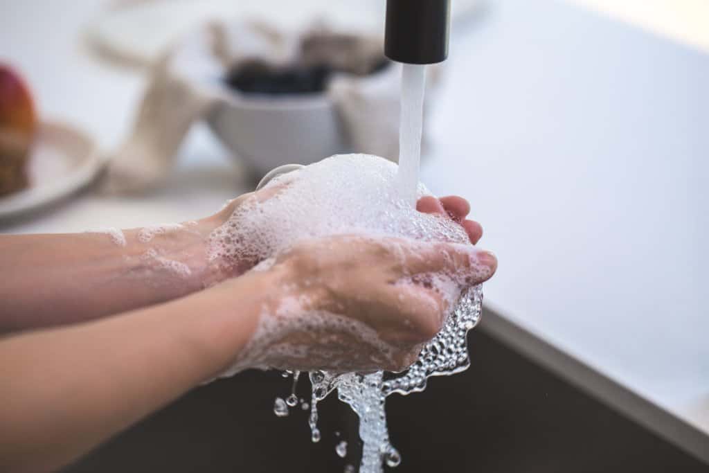 how to stay healthy while traveling - wash your hands!