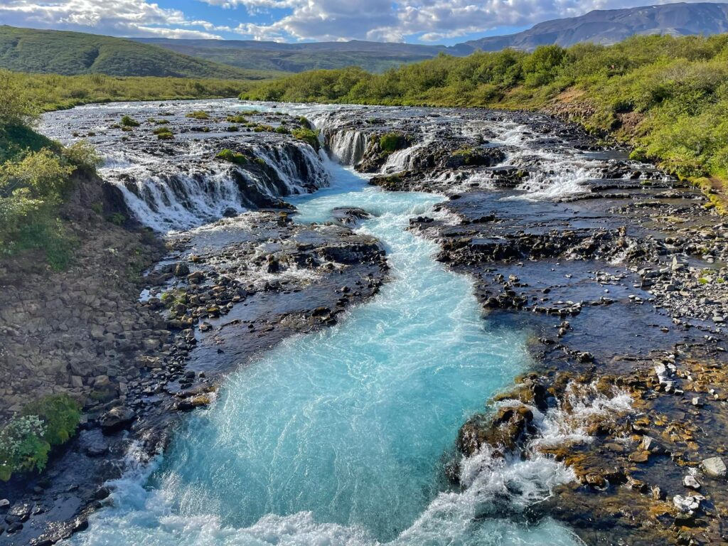 Bright blue Bruarfoss Waterfall Iceland