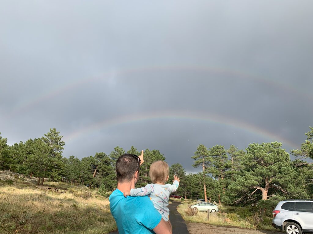 1 year old and dad looking at double rainbow