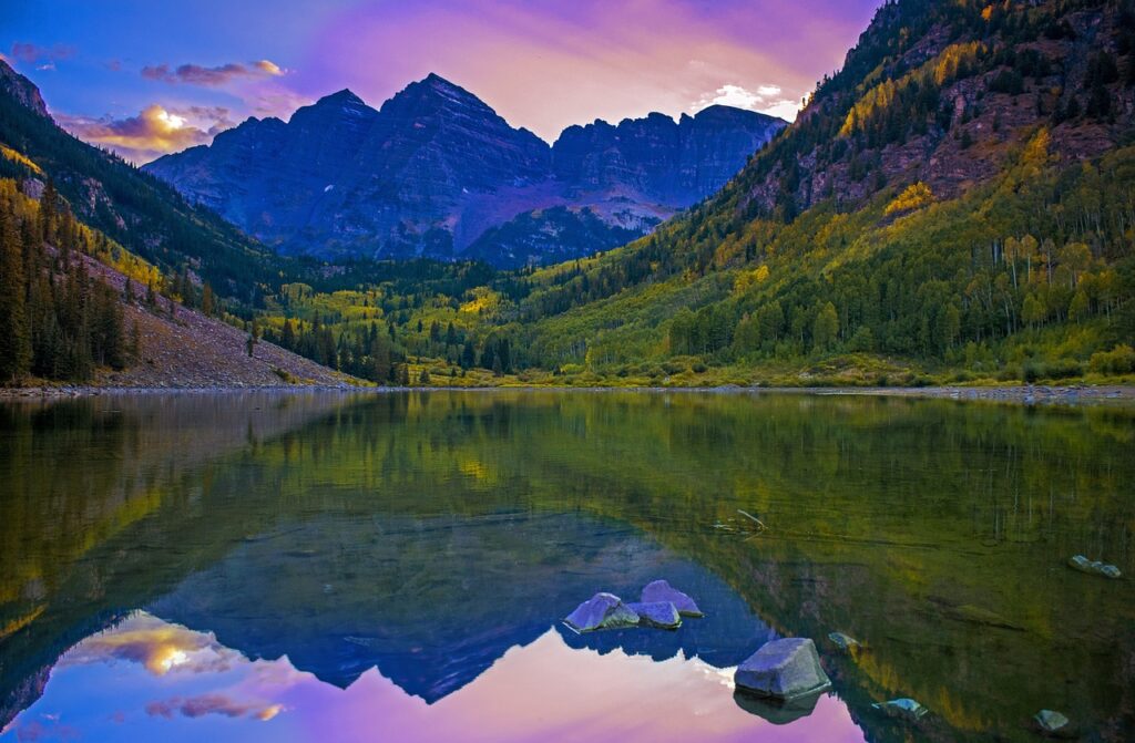 Maroon Bells Colorado at sunrise, purple skies and mountains