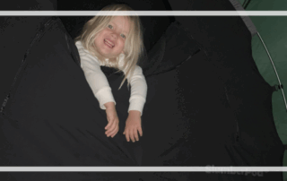 slumberpod with toddler inside